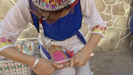 Bai-Ethnic-Minority-Person-Making-Crafts-in-Village-in-Yunnan,-China