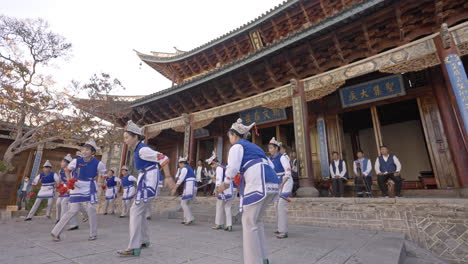 Ethnic-Minority-People-Performing-Traditional-Dance-in-Yunnan,-China