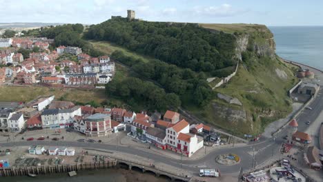 Aerial-bird's-eye-view-of-Scarborough-town,-beach,-harbour-and-castle