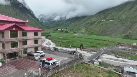 Accending-Reveal-drone-shot-of-Hotel-between-beautiful-green-valley-in-Naran-Batakundi-Northen-region-of-Pakistan