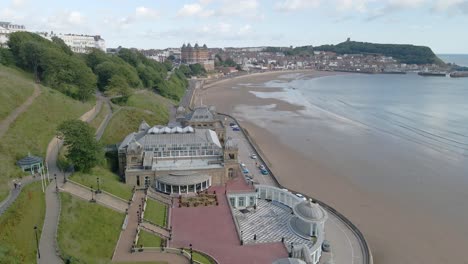 Aerial-bird's-eye-view-of-Scarborough-town,-beach,-harbour-and-castle