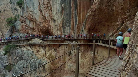 Caminito-del-Rey-trail-is-a-wooden-boardwalk-along-the-face-of-a-cliff-editorial