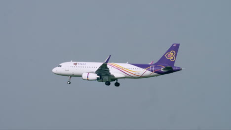 Thai-Smile-Airways-prepares-for-Landing-at-Suvarnabhumi-Airport,-Thailand