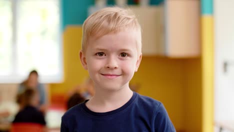 Portrait-of-smiling-preschool-boy