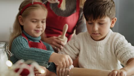 Handheld-video-of-children-making-gingerbread-pastry