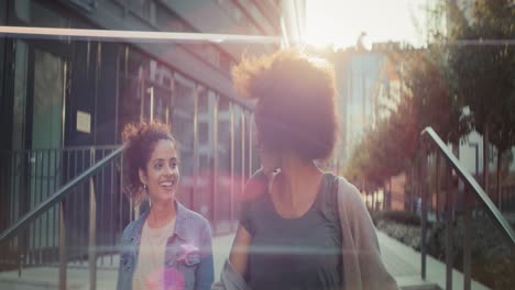 Video-of-female-friends-walking-down-the-stairs-outside