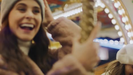 Video-of-women-having-fun-on-carousel--in-funfair