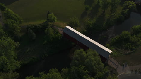 Aerial-View-Of-Zumbrota-Covered-Bridge-In-Covered-Bridge-Park,-Zumbrota,-Minnesota,-USA