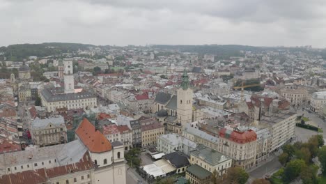 Aerial-Drone-Video-of-European-City-Lviv,-Ukraine,-Rynok-Square,-Central-Town-Hall,-Dominican-Church
