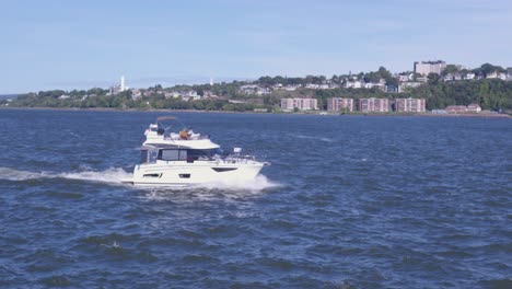 Wide-of-a-Boat-Traveling-on-the-Saint-Lawrence-River-in-Quebec,-Canada