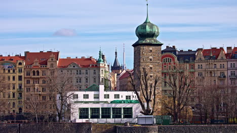 Mánes-building-with-historical-water-tower-on-Prague-Vltava-embankment