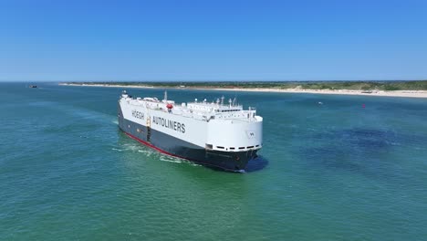 Vehicle-cargo-carrier-the-Hoegh-Sydney-sailing-past-Zoutelande,-Netherlands