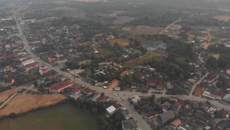 Drone-view-of-vang-vieng-city-at-Laos-in-the-morning,-aerial