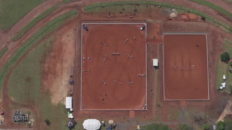 Aerial-view-of-the-Show-jumping-contest-with-riders-performing-stunts
