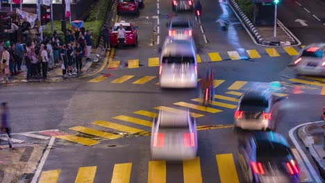 Close-Time-Lapse-of-Busy-Crossing-at-Kuala-Lumpur's-Jalan-Sultan-Ismail-and-Jalan-Bukit-Bintang-Intersection,-Malaysia