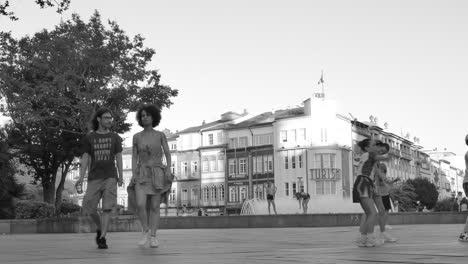 Vintage-Shot-Of-People-Strolling-At-The-Republic-Square-In-Braga,-Portugal