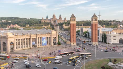 Stunning-Time-lapse-of-Plaça-d'Espanya-Roundabout-in-Barcelona-Featuring-the-Majestic-National-Palace-with-Busy-Traffic,-Spanish-Landmarks,-Cityscape-and-Tourism