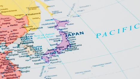 Close-up-of-the-country-word-Japan-on-a-world-map-with-the-detailed-name-of-the-capital-city