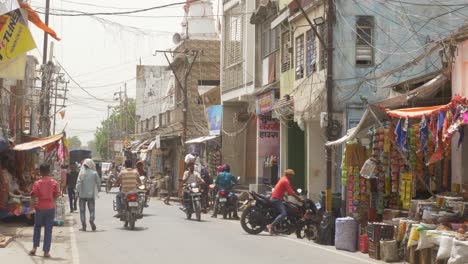 People-on-the-busy-street-in-summer-heat-wave-and-wind-storm