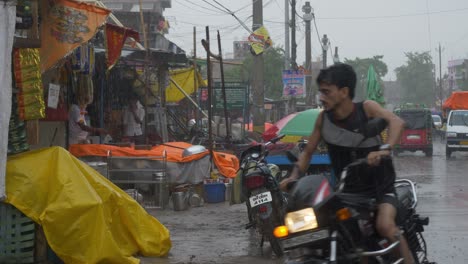 Street-vendors-during-heavy-rainfall-after-heat-wave-in-summer