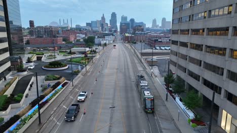 Kansas-City-street-train-headed-towards-downtown-city-skyline