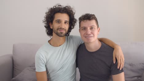 Happy-handsome-gay-couple-posing-at-home