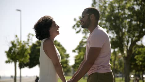Happy-multiethnic-couple-in-park