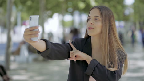 Girl-holding-smartphone-and-having-video-chat