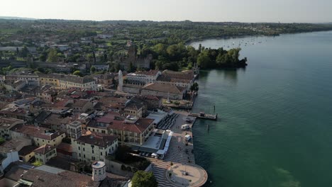 Drone-footage-of-Italian-city-and-promenade-on-the-water