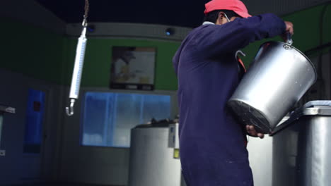 wide-shot-of-man-pouring-milk