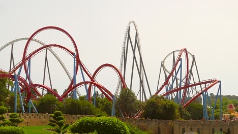 Roller-Coaster-Rides-Of-Shambhala-And-Dragon-Khan-In-Port-Aventura-Park-In-Salou-And-Vilaseca,-Catalonia,-Spain