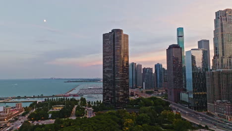 Aerial-view-around-the-Lake-Point-Tower-condominium,-sunny-evening-in-Chicago,-USA