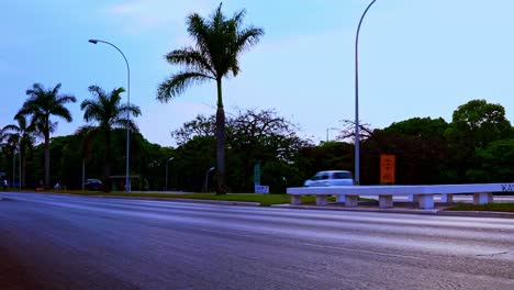 In-fading-light-vehicles-travel-on-a-busy-highway