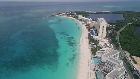 Aerial-high-angle-of-Cancun-Mexico-Riviera-Maya-Hotel-zone-blue-clean-ocean-in-Caribbean-Sea
