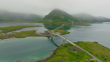 Cinematic-aerial-footage-of-the-famous-Fredvang-bridge-in-Lofoten,-Norway