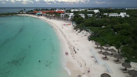 Aerial-View-Over-the-Cancun-Coastline-Beachfront-with-Hotels-and-Resorts