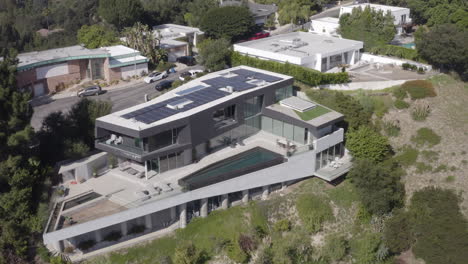 Epic-aerial-pullback-from-modern-Beverly-Hills-mansion