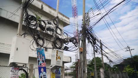 Low-angle-view-of-electrical-wiring-on-street