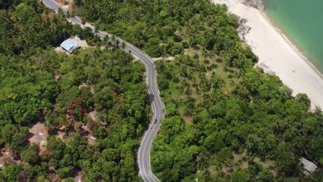 Beautiful-aerial-view-of-the-Sichon-Khanom-seaside-Road,-South-Thailand