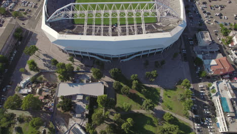 Tilt-up-Revealing-tel-aviv-Bloomfield-football-Stadium-from-a-drone,-the-Stadium-hosted-musical-acts-from-time-to-time-and-It-is-the-home-of-three-soccer-clubs