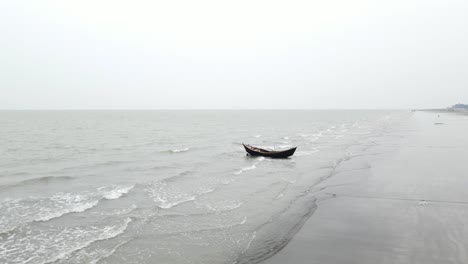 Wooden-Fishing-Boat-Isolated-On-Tropical-Sea-With-Calm-Waves