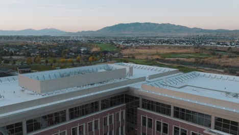FamilySearch-building-in-Lehi,-Utah---pullback-aerial-reveal