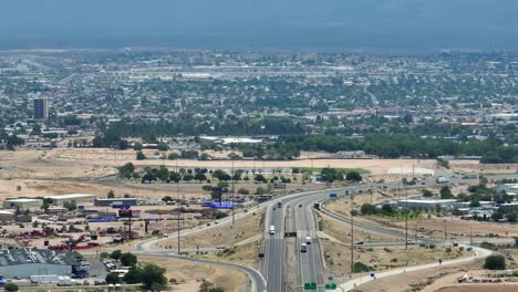 Sprawling-desert-as-cars-leave-Las-Cruces,-New-Mexico