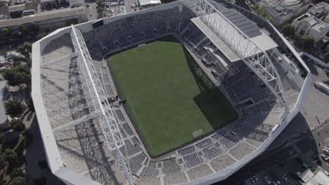 Raw-file---Parallax-from-a-high-altitude-of-Bloomfield-football-Stadium-with-a-capacity-of-29,400-seats,-empty-from-crowd,-It-hosted-musical-acts-from-time-to-time