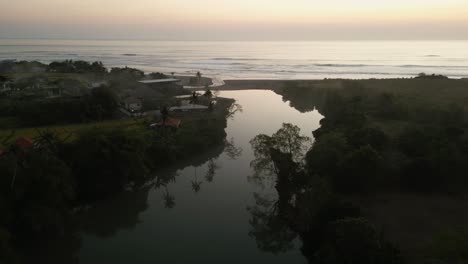 Golden-dusk-light-on-Cemagi,-Bali-lagoon-and-calm-evening-ocean