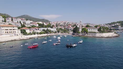 Aerial---Hvar,-Croatia:-Serene-harbor-with-moored-boats,-Adriatic-allure