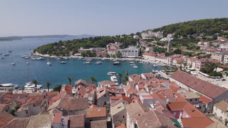 Aerial---Hvar,-Croatia:-Harbor-charm-amidst-picturesque-island-landscape