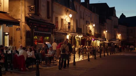 Fine-dinning-in-the-streets-of-a-small-French-town-on-a-Summer’s-evening