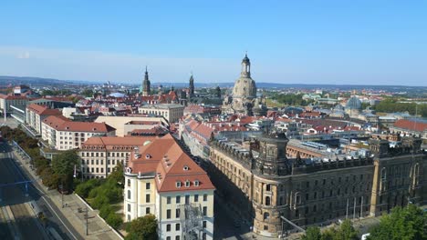 Magic-aerial-top-view-flight-Police-Department-Dresden-city-Women-church-Frauenkirche-City-town-Germany,-summer-sunny-blue-sky-day-23