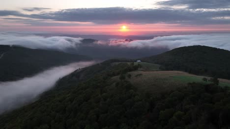 aerial-over-mountain-cabin-at-sunrise-near-boone-and-blowing-rock-nc,-north-carolina